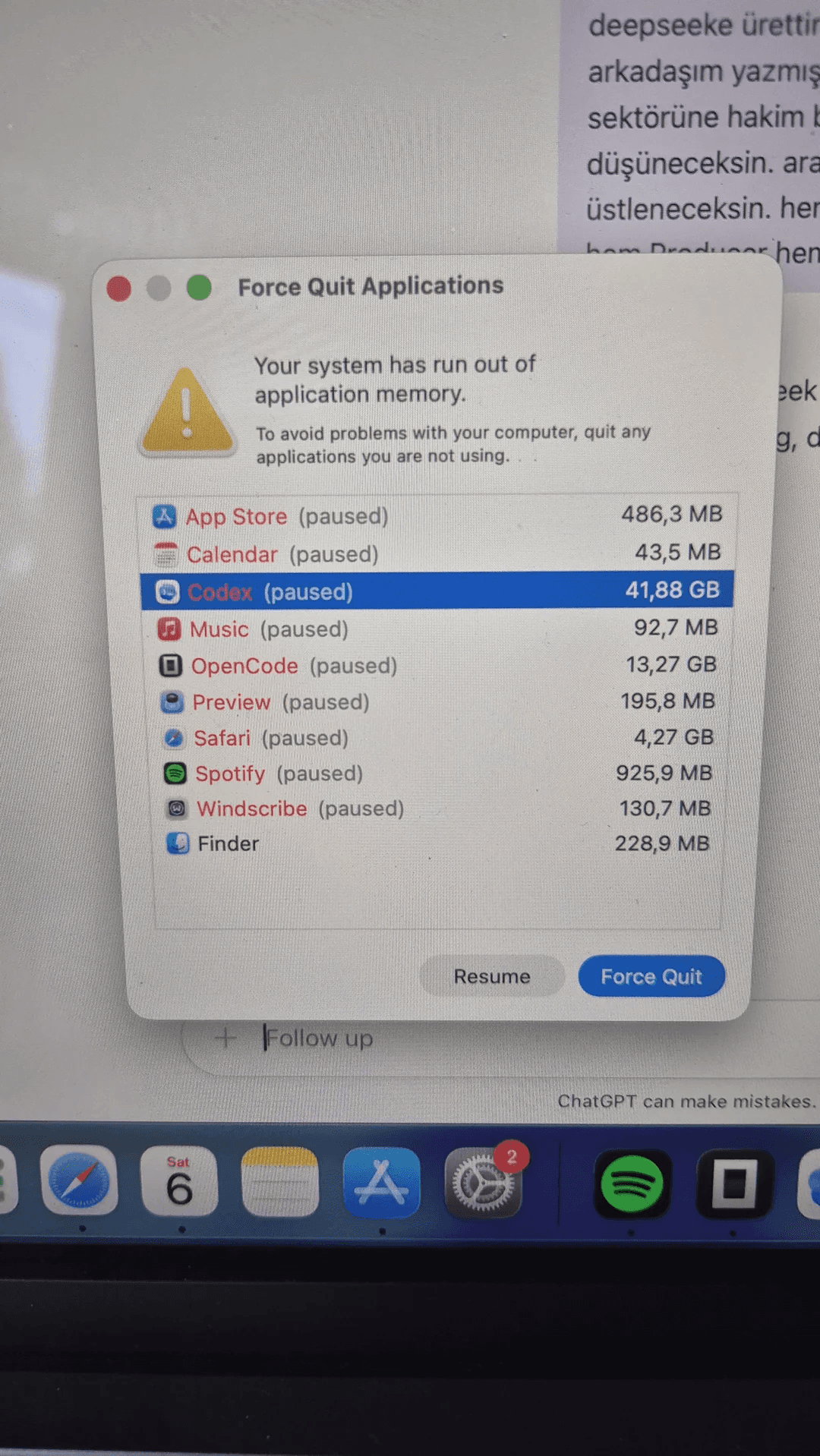 macOS warning that the system has run out of application memory, with Codex using 41.88GB and OpenCode using 13.27GB