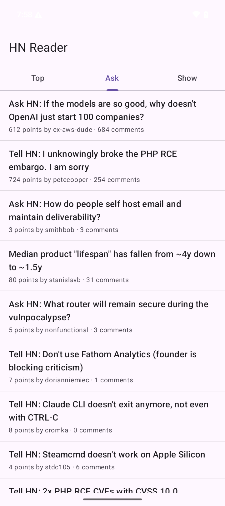 The fixed build on the cloud emulator, showing the Ask tab with Ask HN and Tell HN posts and no site line under them